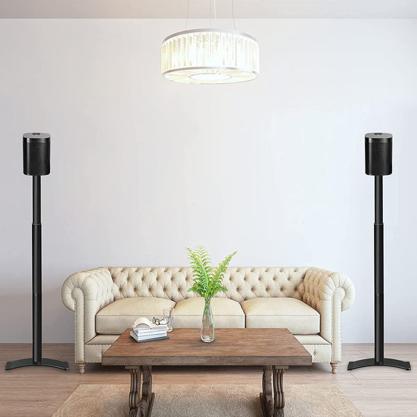 2 surround sound speaker stands in the living room